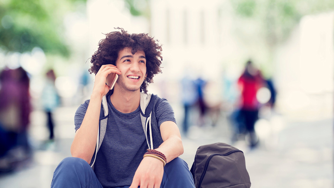 Student on phone to Clearing hotlines.