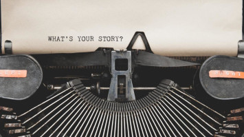 What's Your Story question printed on an old typewriter