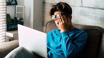 Student checking their results on their laptop