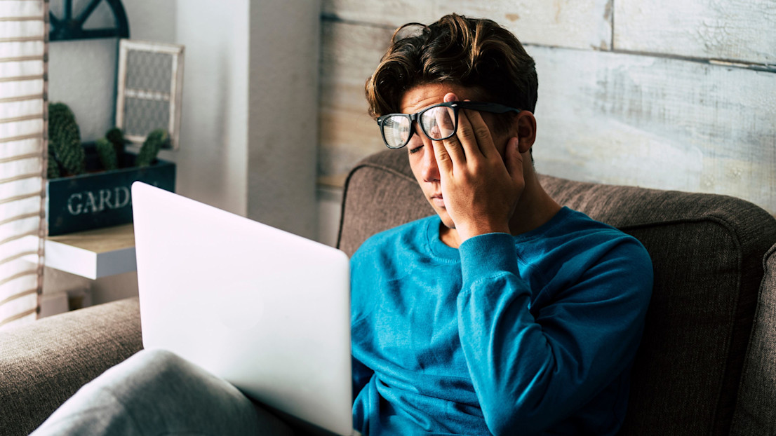 Student checking their results on their laptop