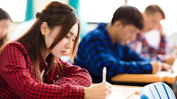 International students writing an exam