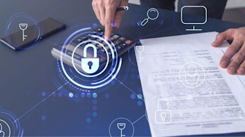 Accountant hands doing calculations on a desk