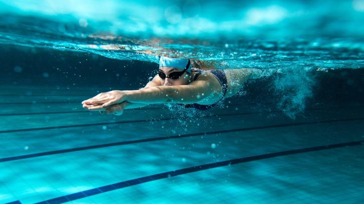 University student swimming in a swimming pool