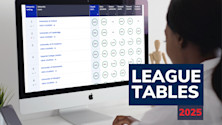 A female student browses the Complete University Guide League Tables on her desktop computer