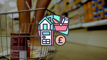 Shopping basket close up with supermarket shelves in the background
