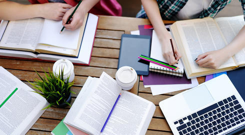  Top view of students studying or doing homework 
