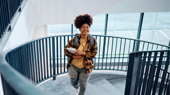  Female climbing stairs at university - iStock - What happens after submitting your UCAS application?