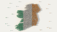 Graphic representing jobs in Ireland, with the country's flag - formed in the shape of the island by a gathering group of people - viewed from overhead