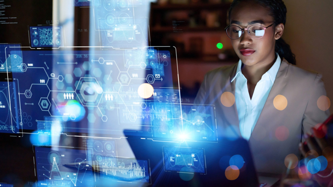 Woman working on IT systems