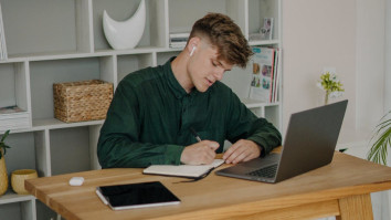 Student on his laptop at a virtual open day