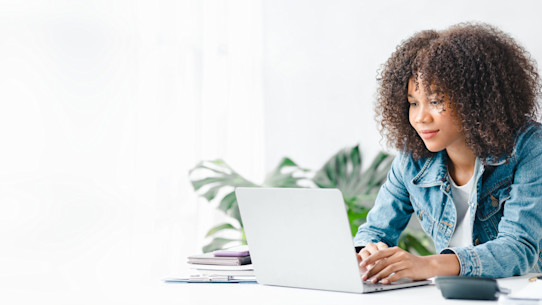 Student working on a laptop