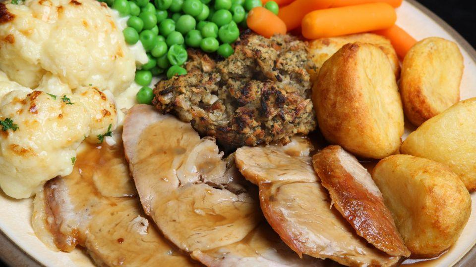 eating sunday roast in england