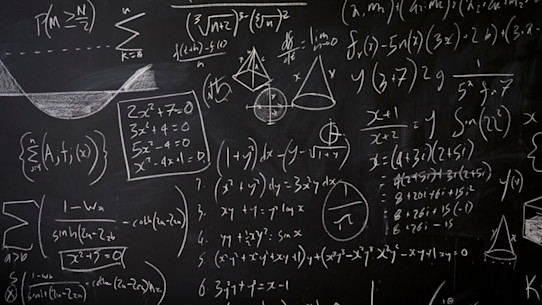 Mathematical equations on a blackboard