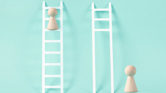 Light blue background with two different ladders with a board game counter at the top of one, and another counter at the bottom of the other