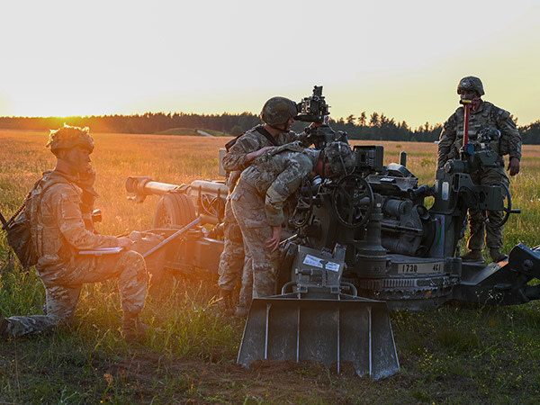 soldiers on ground working together