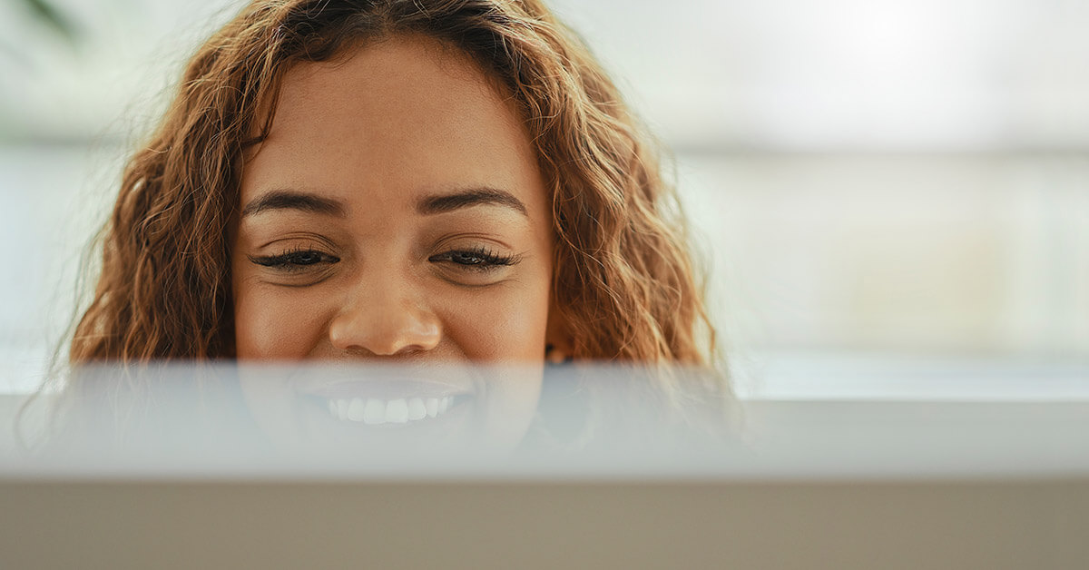 Woman, reading and good news on computer 