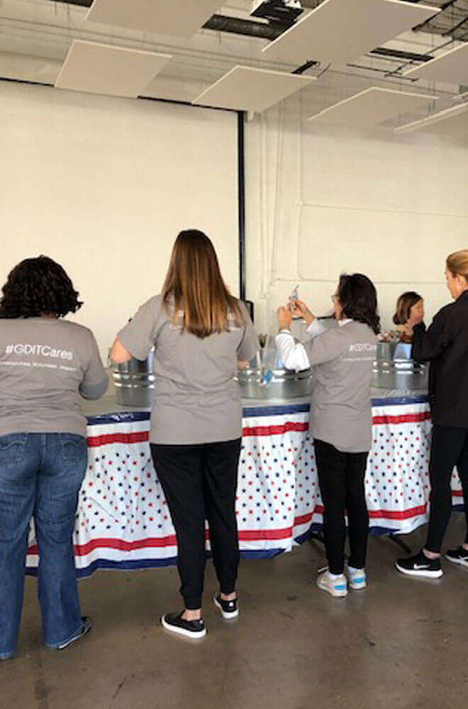 group of people packing packages