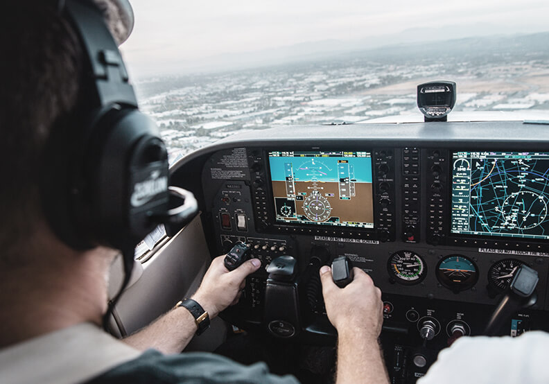 man flying plane