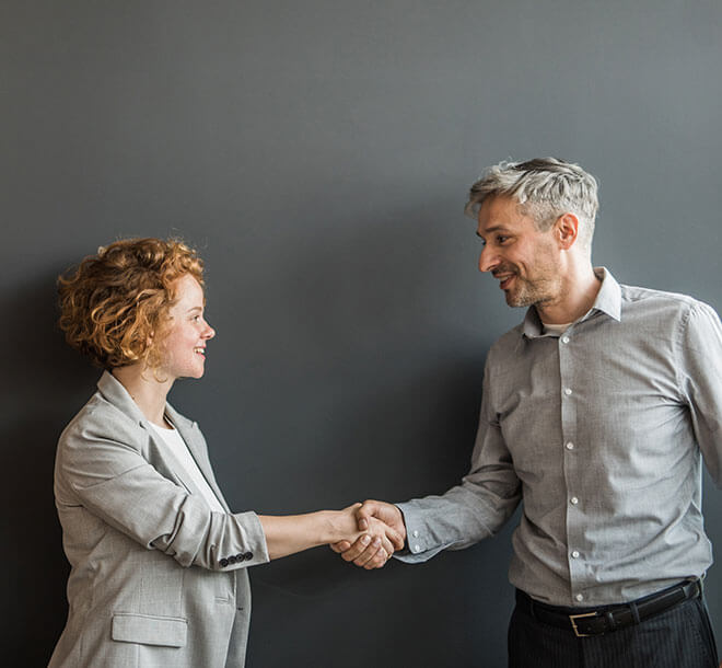 coworkers shaking hands