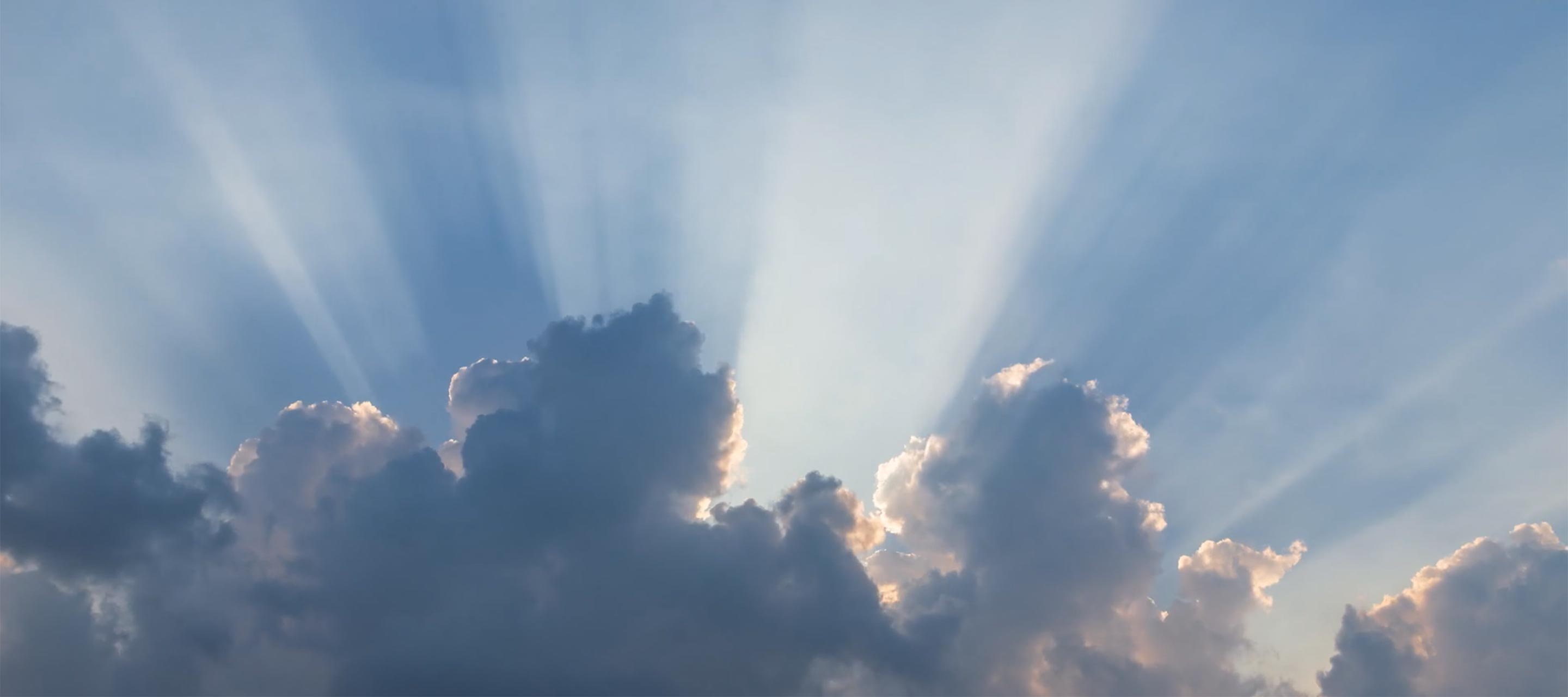 clouds and sunshine rays coming out