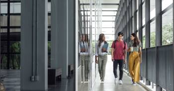 student walking in hallway