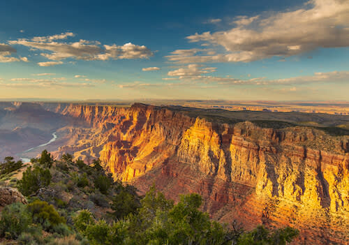 Cloudy blue sky and canyons