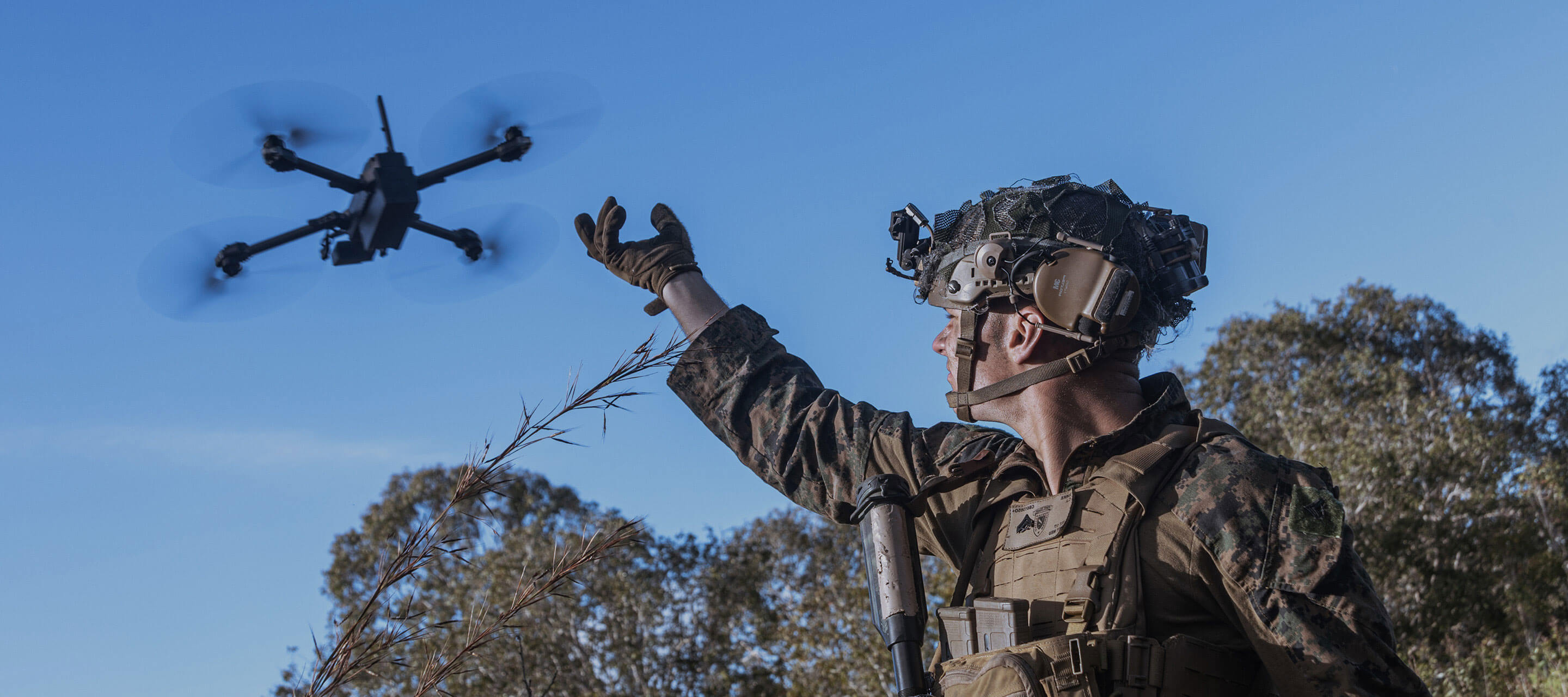 soldier launching drone