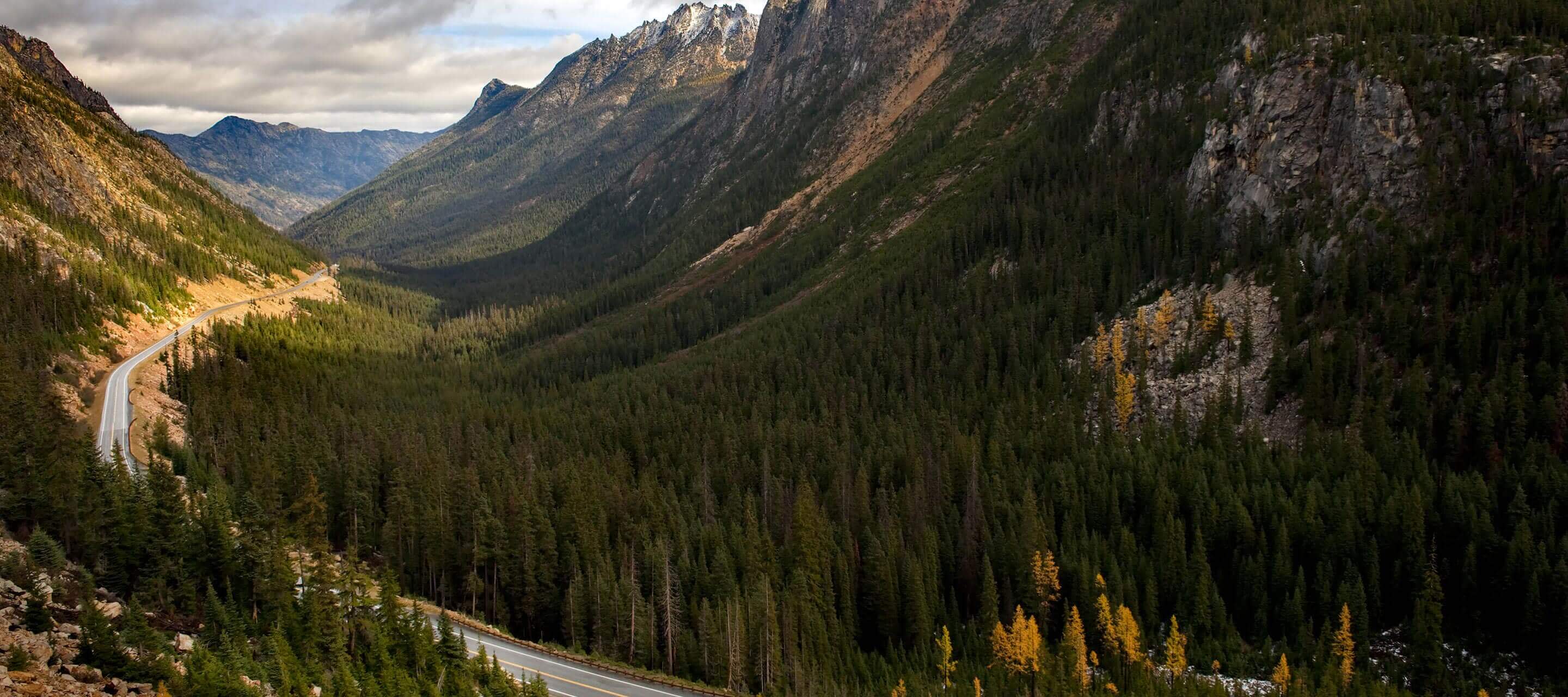 Road through mountains side