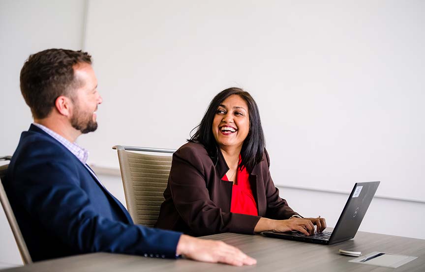 two coworkers in a meeting