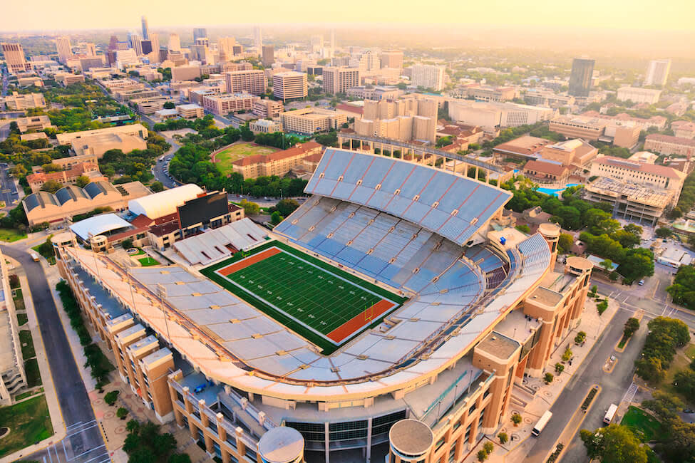 Football field with a city scape in the background