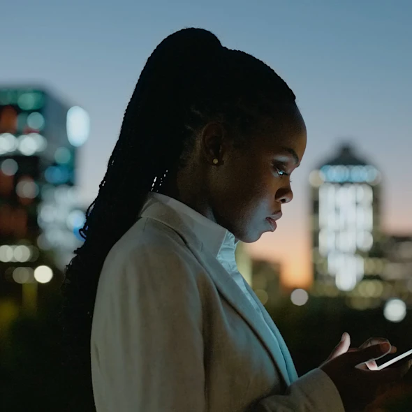 woman looking at phone