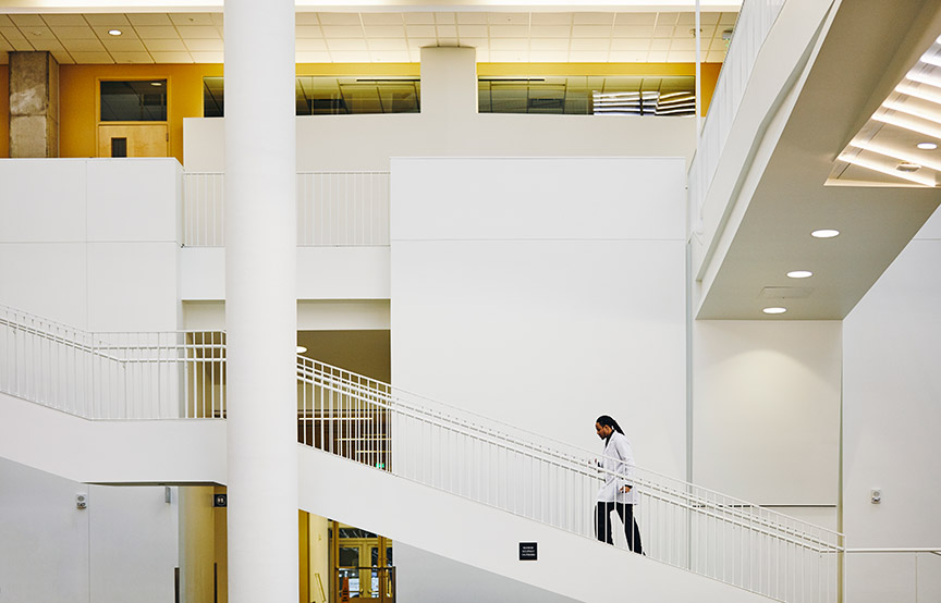health professional walking up stairs