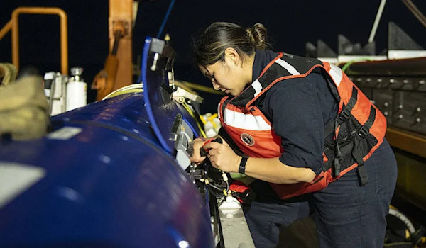 woman working on maintenance check