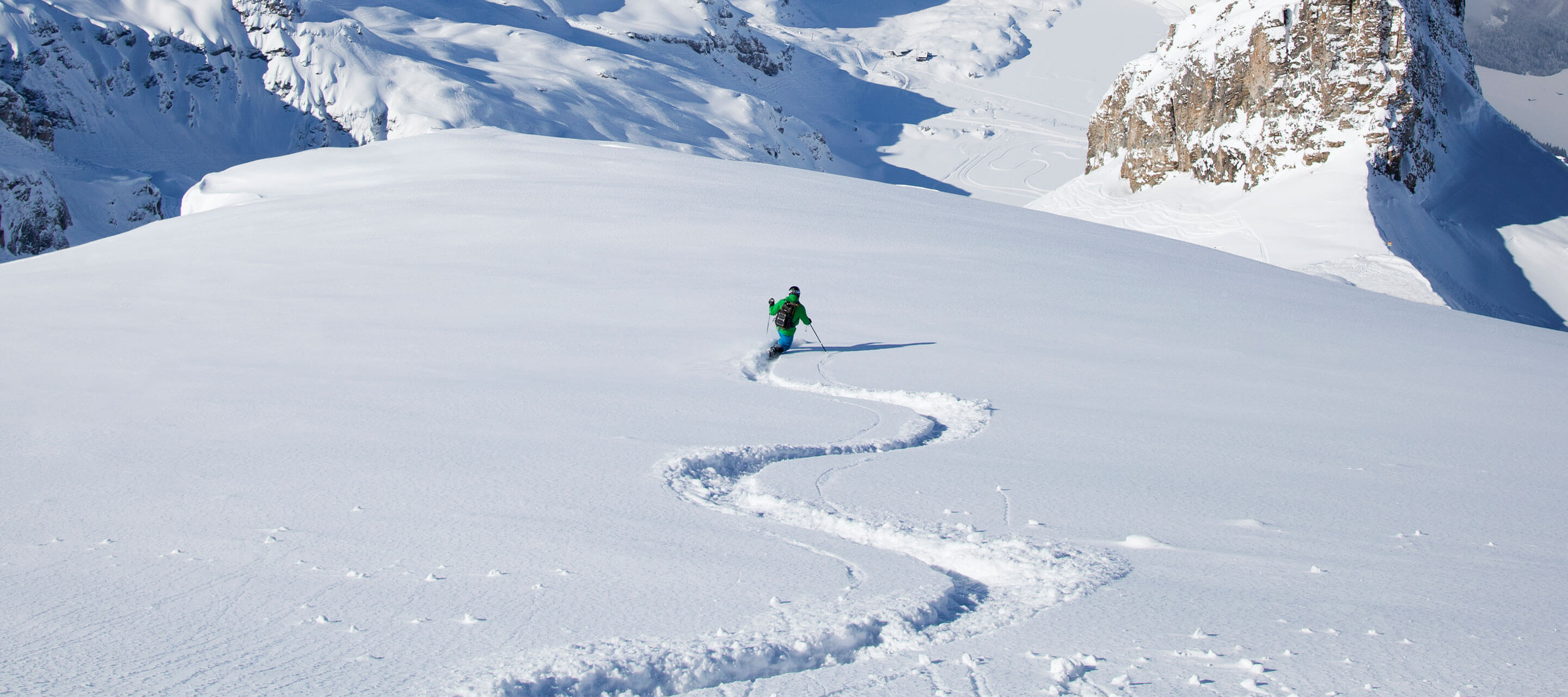 skier going down mountains