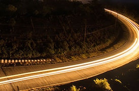 time lapse photo of cars on a road