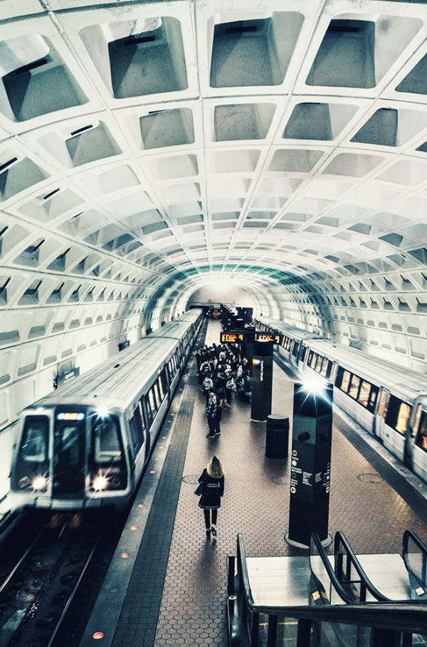Train arriving in a Washington D.C. metro station.