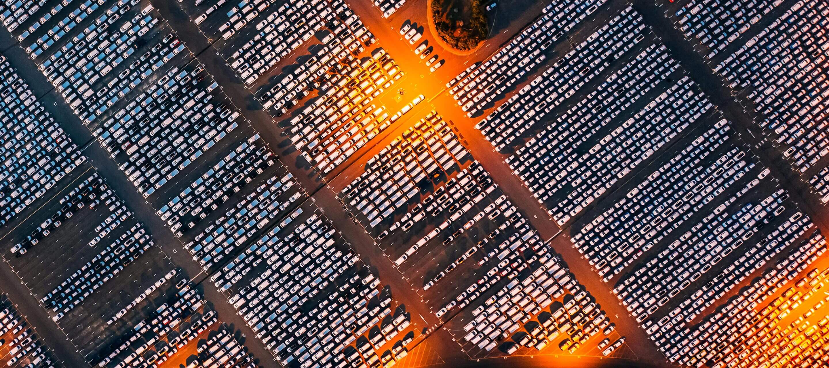 Aerial view of new cars lined up at Industrial factory Port for shipping to worldwide