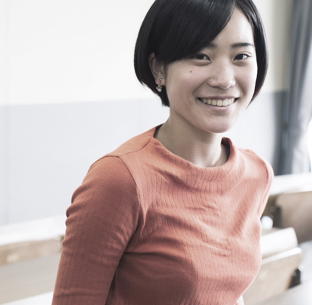 young asian woman smiling