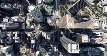 aerial view of city skyscraper buildings' rooftops'