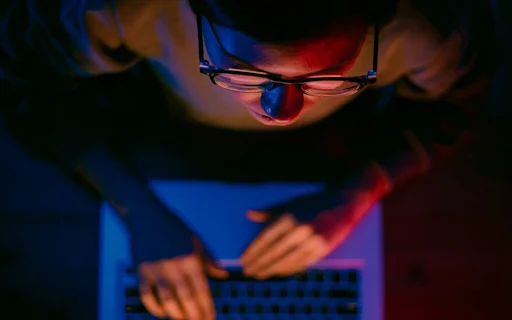 person on computer