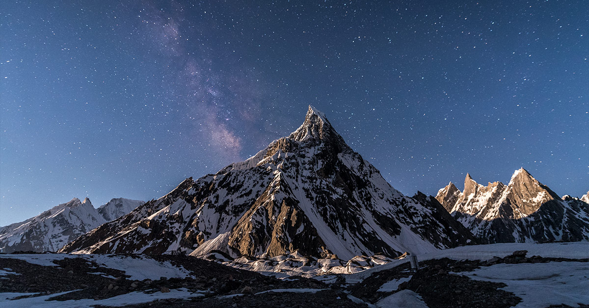 image of mountain with stars in background