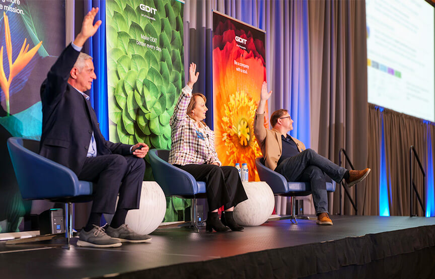 People on stage at GDIT event