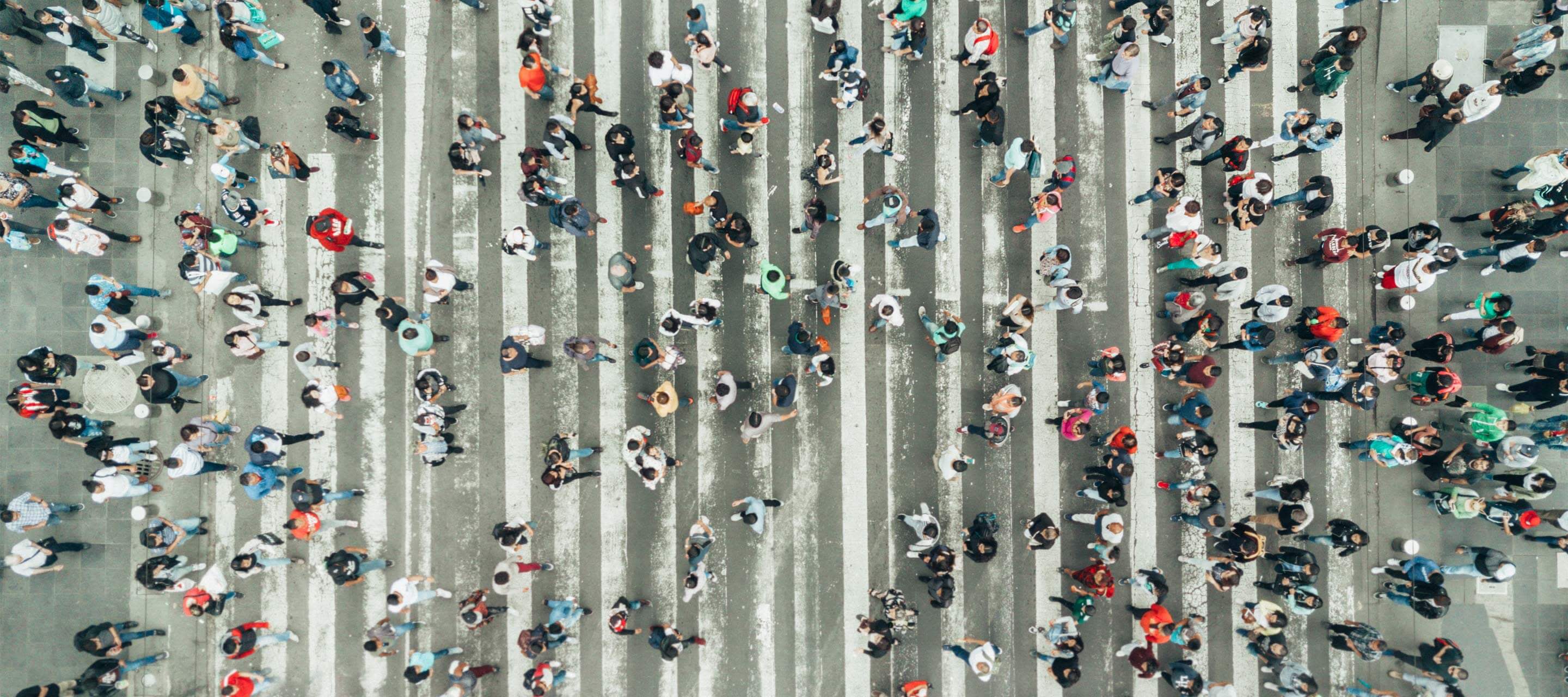 image shows an aerial view of a busy crosswalk