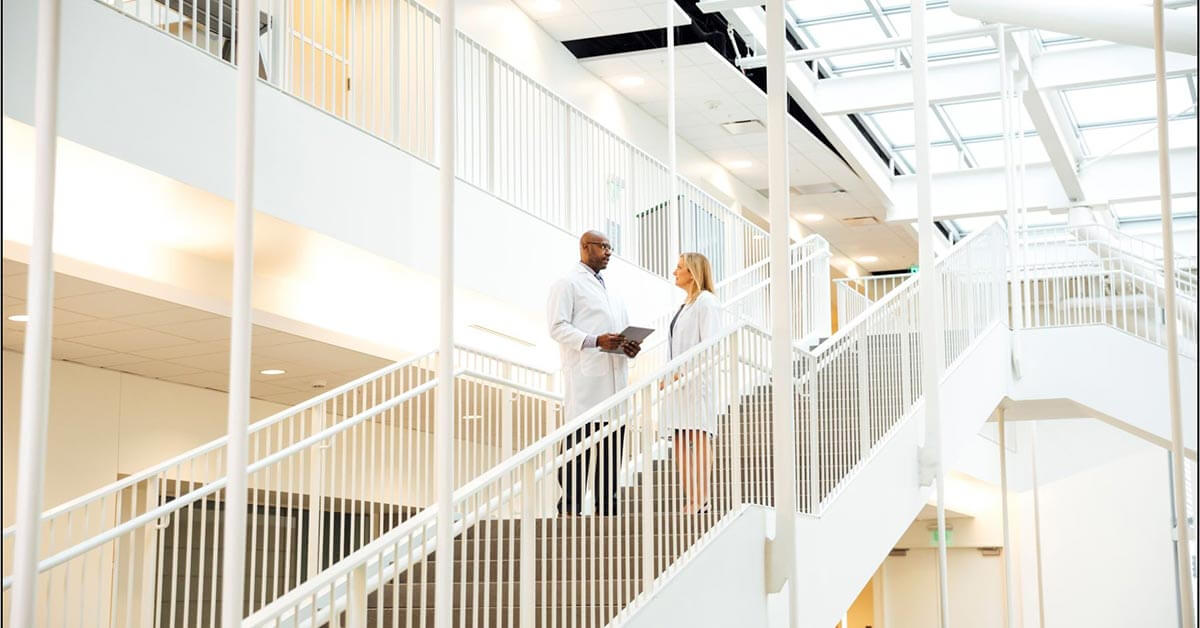 doctors walking down the stairs 