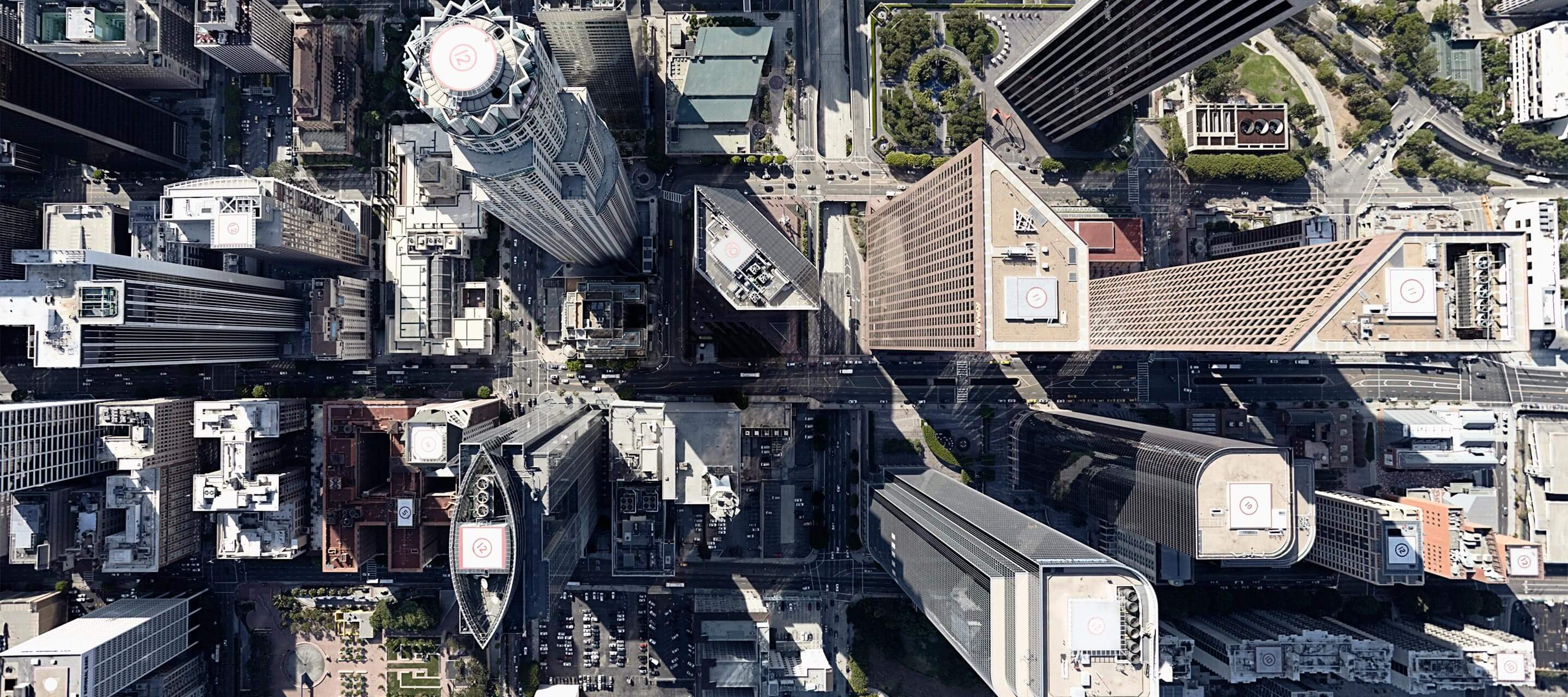 aerial view of city skyscraper buildings' rooftops'