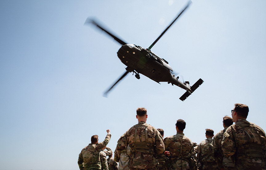 soldiers looking up at sky