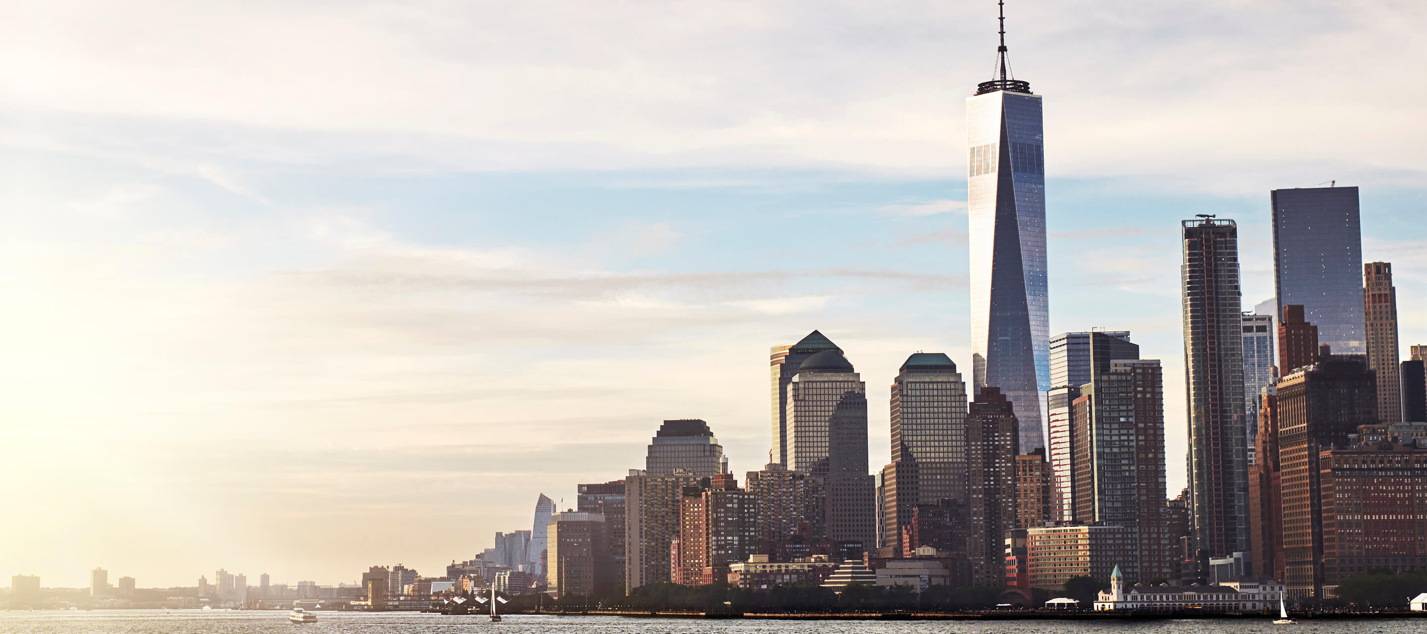 image of NYC skyline with the river on the left side