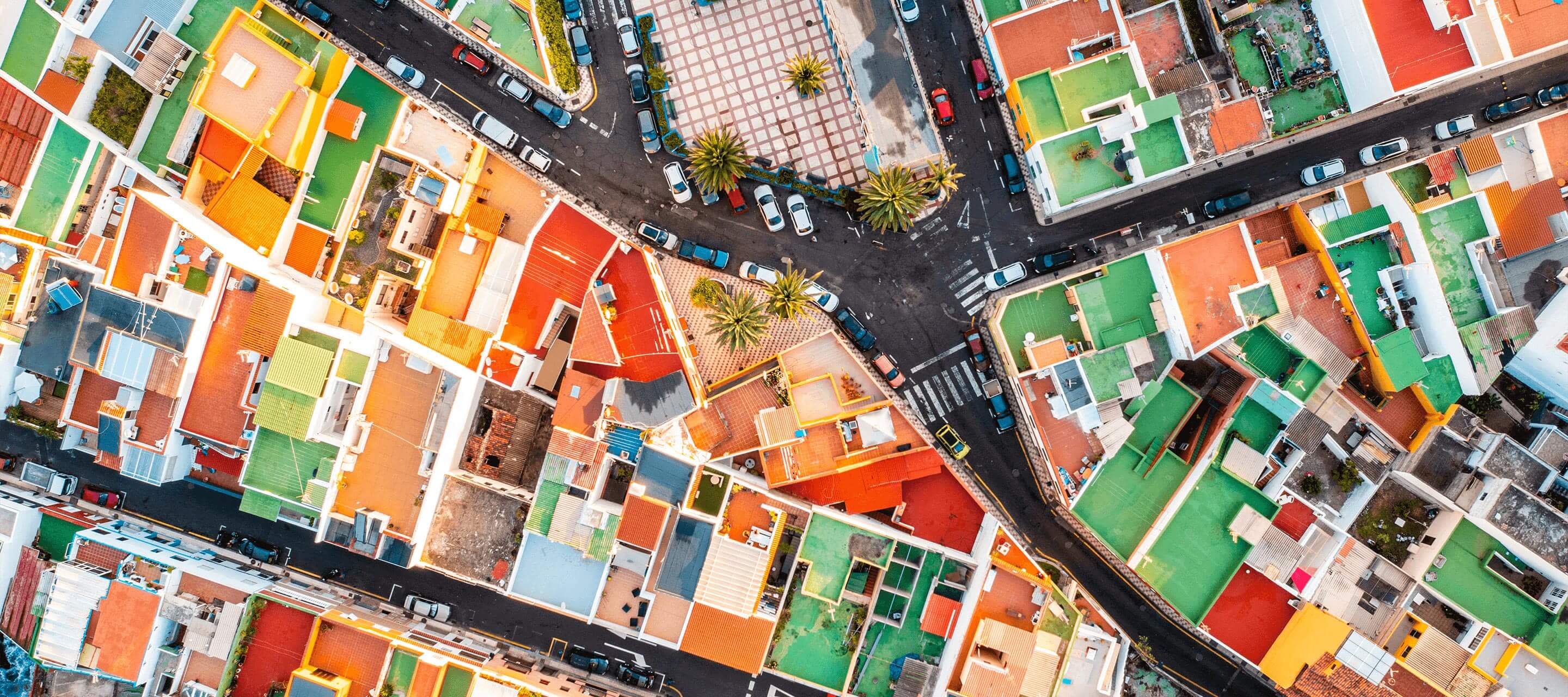 aerial view of colorful rooftops and streets