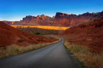 road leading to a canyon