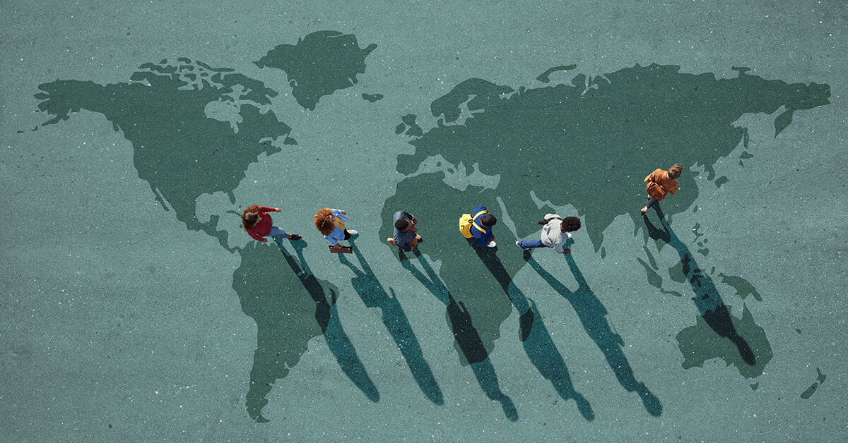 aerial view of people crossing street with shadow or global map 